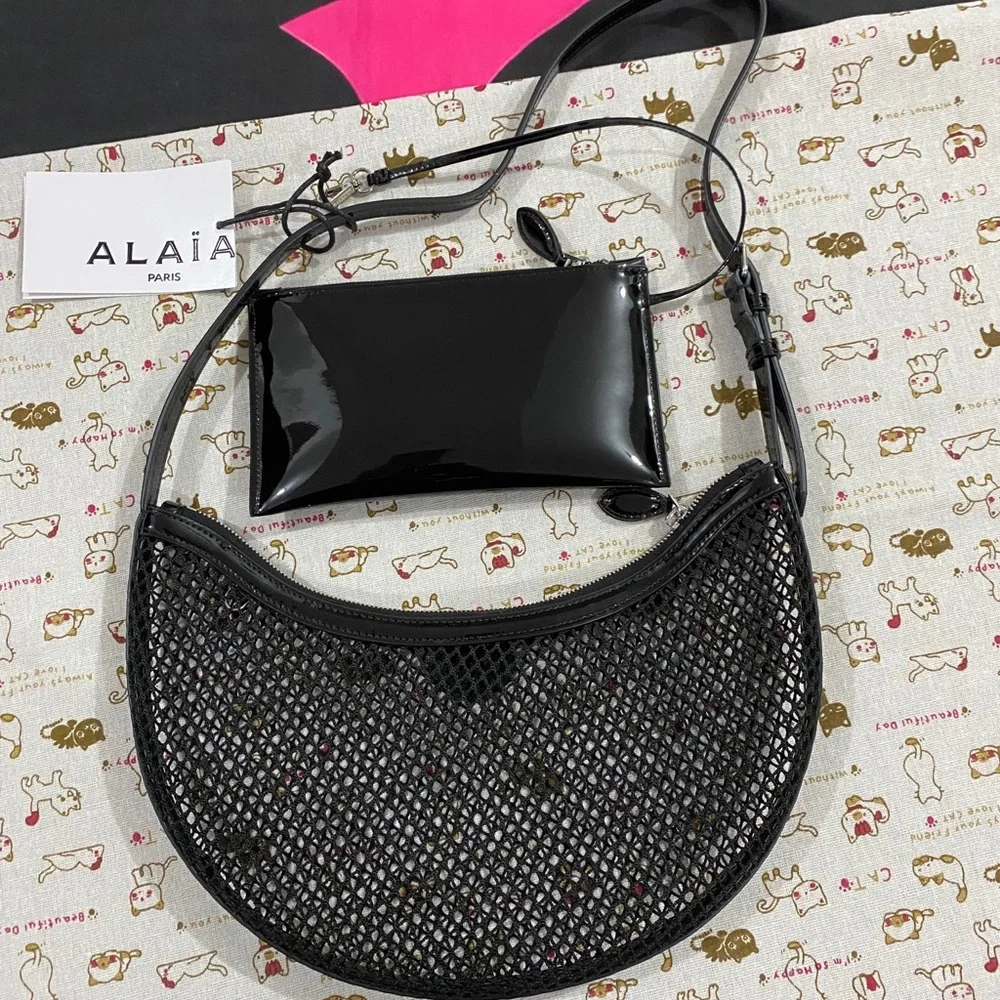 Alaïa Black Woven Crescent Shoulder Bag